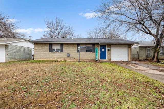 single story home with a garage and a front lawn