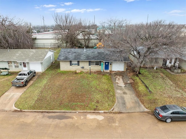 ranch-style house with a front lawn