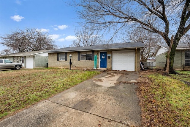 single story home featuring a garage and a front lawn