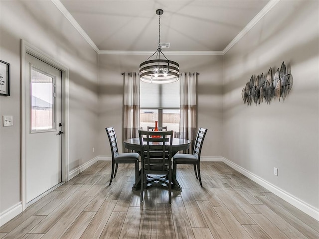 dining room featuring ornamental molding