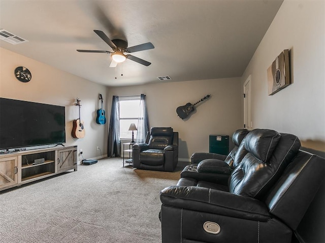 carpeted living room featuring ceiling fan