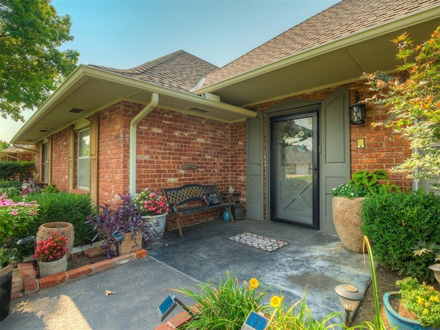 property entrance with a patio