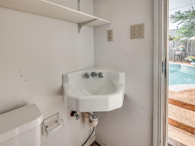 bathroom with sink and toilet