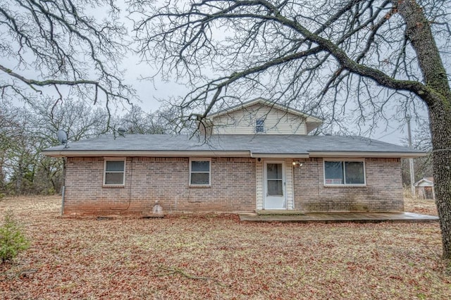 back of property featuring a patio