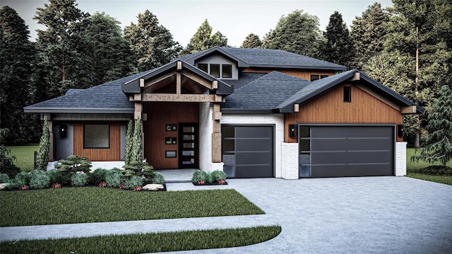 view of front facade with a garage and a front lawn