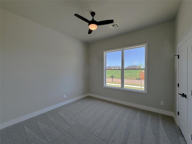 15521 Aparados Way, Edmond, OK 73013 - unfurnished room with baseboards, visible vents, and light colored carpet