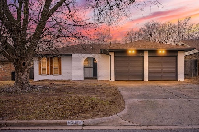 ranch-style home with a garage