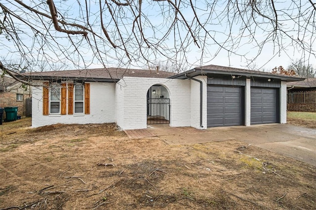 single story home with a garage