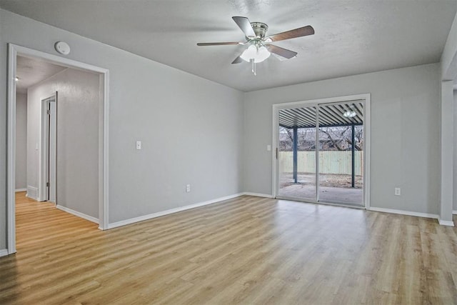 unfurnished room featuring ceiling fan and light hardwood / wood-style flooring