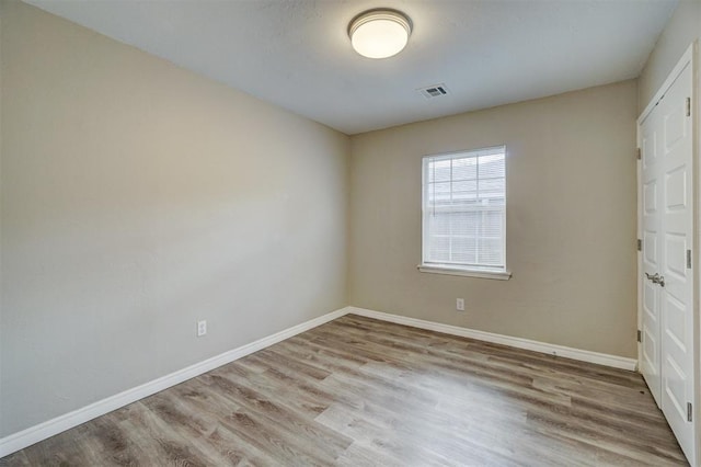 unfurnished bedroom with light hardwood / wood-style floors