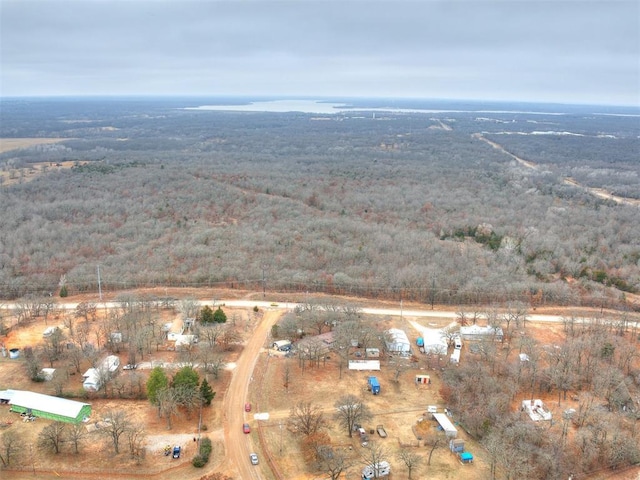 birds eye view of property with a rural view