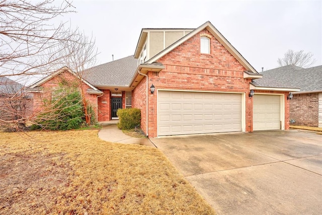 front facade with a garage and a front lawn