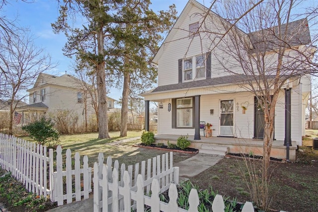 view of front of home featuring a front lawn and covered porch