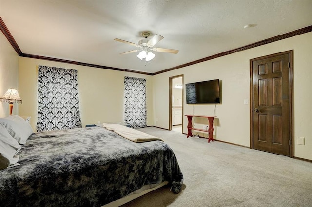 carpeted bedroom with crown molding and ceiling fan