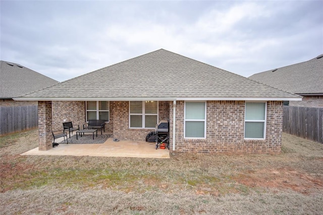 back of house with a patio area