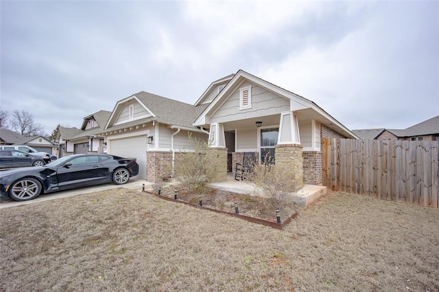 view of front of property with a garage and a porch