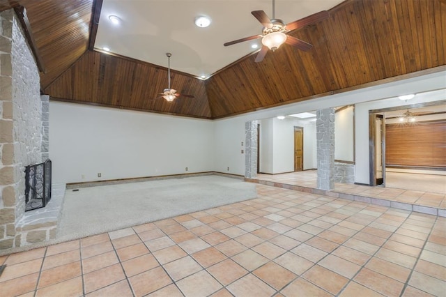 unfurnished living room with high vaulted ceiling, a fireplace, light tile patterned floors, ceiling fan, and wood ceiling