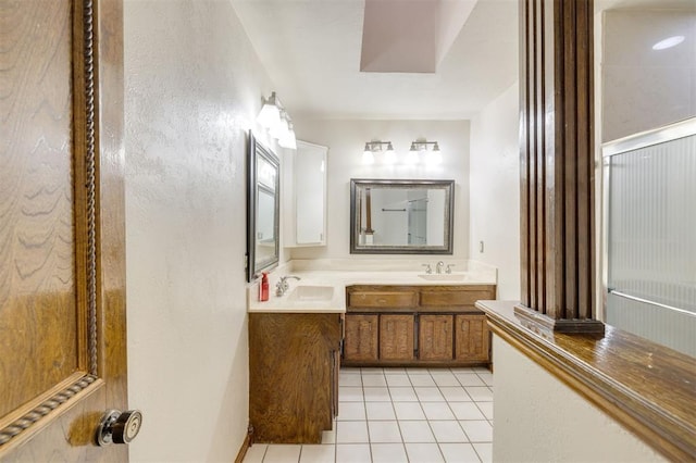 bathroom featuring vanity and tile patterned flooring