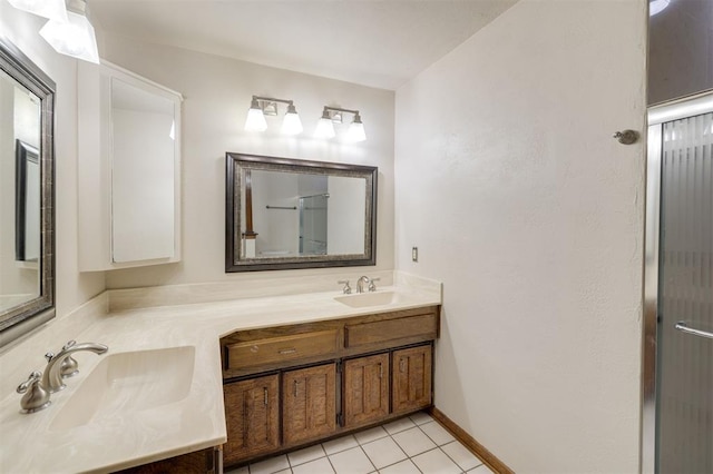 bathroom featuring vanity and tile patterned flooring