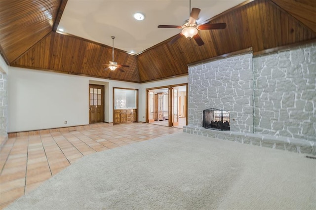 unfurnished living room featuring a stone fireplace, light colored carpet, high vaulted ceiling, wooden ceiling, and ceiling fan