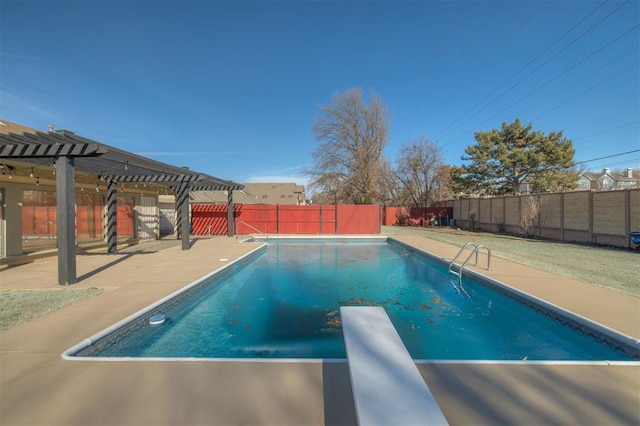 view of swimming pool featuring a pergola and a patio area