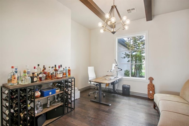 office featuring visible vents, baseboards, beamed ceiling, and wood finished floors