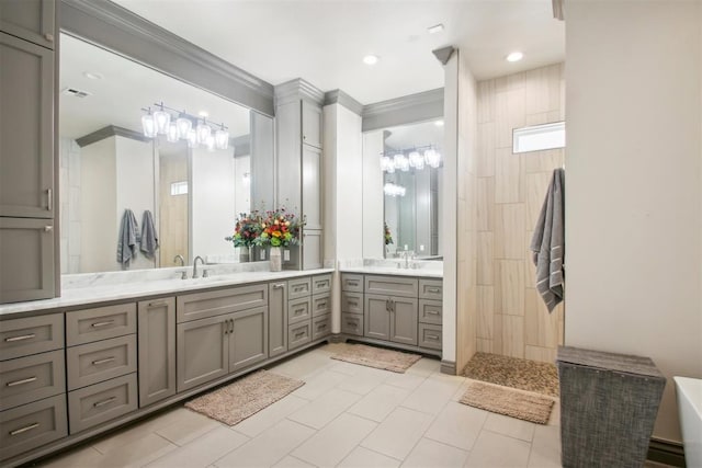 bathroom with visible vents, walk in shower, ornamental molding, recessed lighting, and vanity