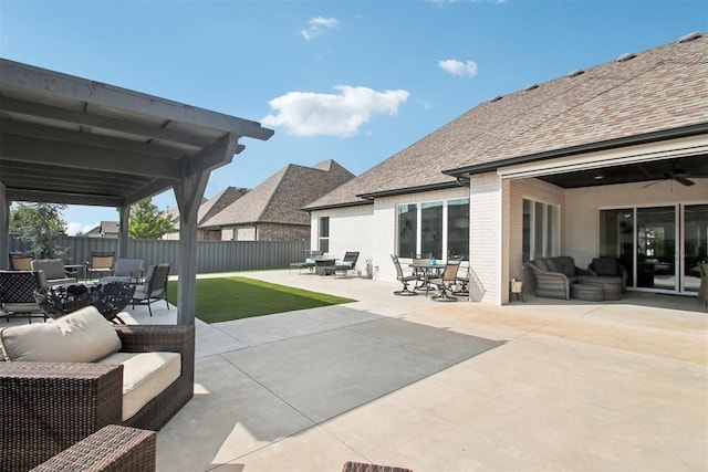 view of patio with ceiling fan, outdoor dining space, outdoor lounge area, and fence