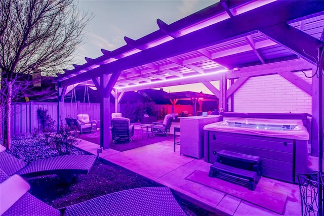 view of patio with a fenced backyard, a pergola, and a hot tub