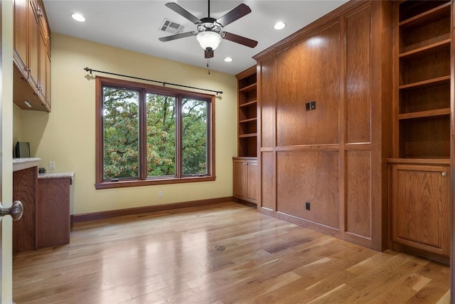 interior space with light hardwood / wood-style floors and ceiling fan