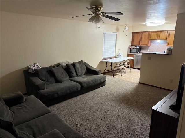 living room featuring carpet floors and ceiling fan