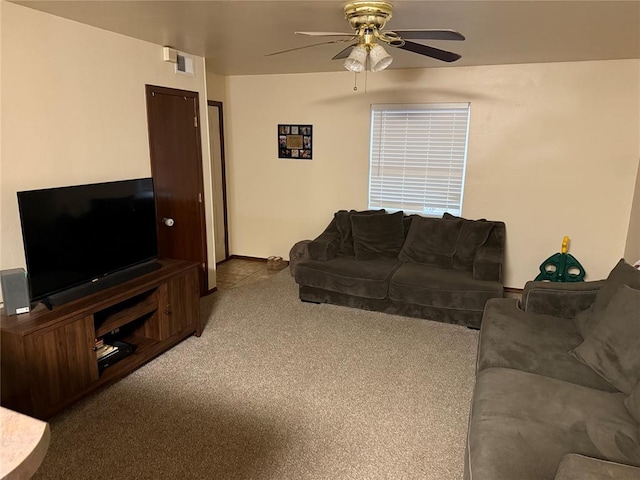 living room with light colored carpet and ceiling fan