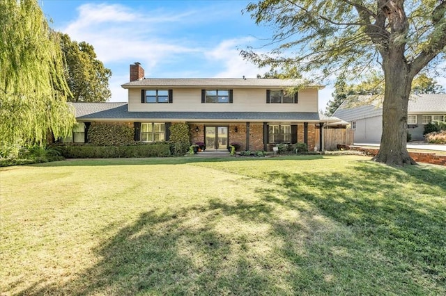 view of front of house with a front lawn