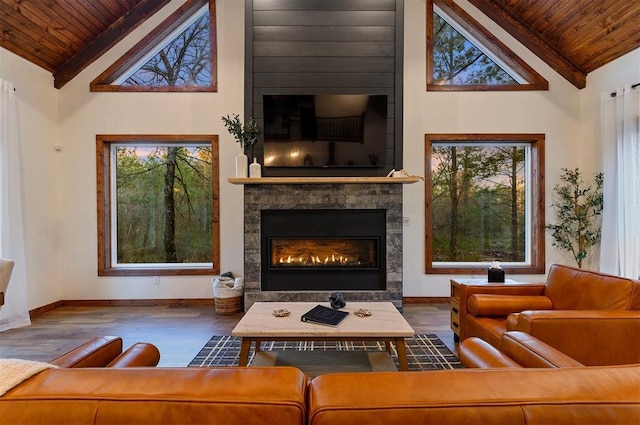 living room featuring high vaulted ceiling, dark hardwood / wood-style floors, a fireplace, and wood ceiling