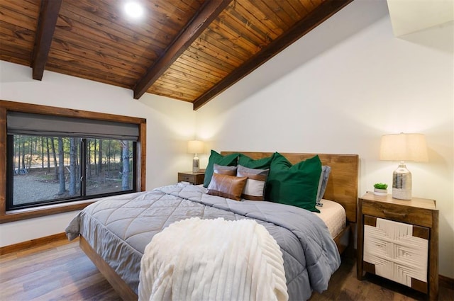 bedroom with wood ceiling, dark hardwood / wood-style flooring, and lofted ceiling with beams