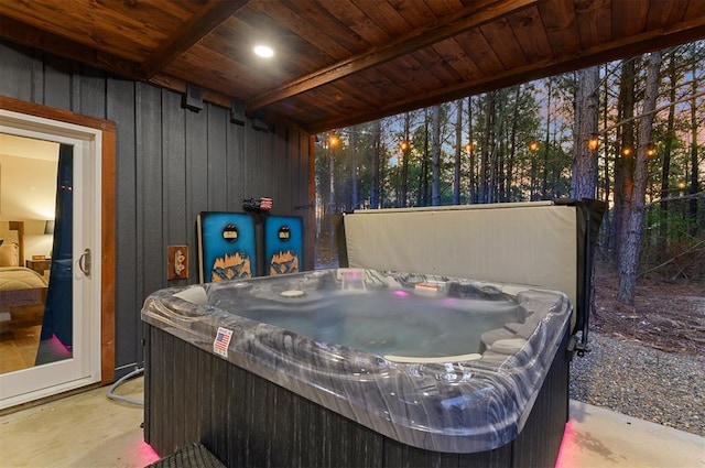 view of patio / terrace with a hot tub