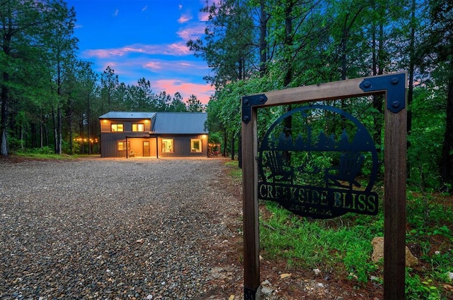 1194 Camp Ranch Rd, Broken Bow, OK 74728 - view of front of property featuring metal roof and driveway