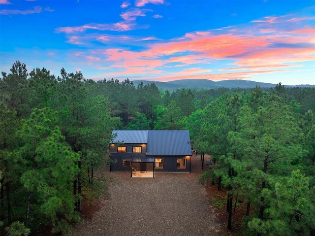 1194 Camp Ranch Rd, Broken Bow, OK 74728 - aerial view of property and surrounding area with a forest and mountains