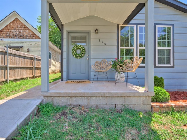 doorway to property featuring a porch