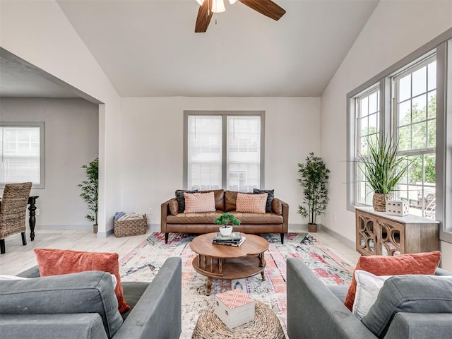 living room with vaulted ceiling and ceiling fan