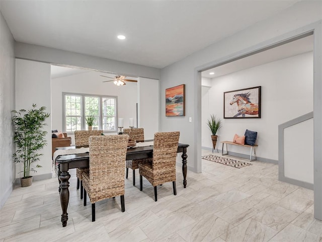 dining space featuring ceiling fan