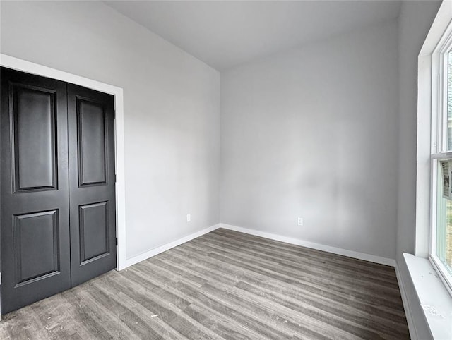 unfurnished room featuring light hardwood / wood-style floors