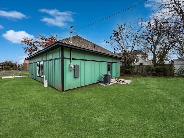 exterior space with a yard and cooling unit