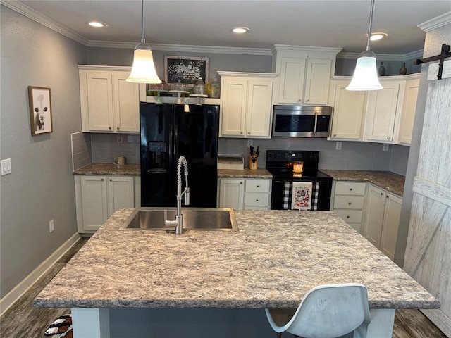 kitchen with backsplash, a sink, baseboards, black appliances, and dark wood-style flooring