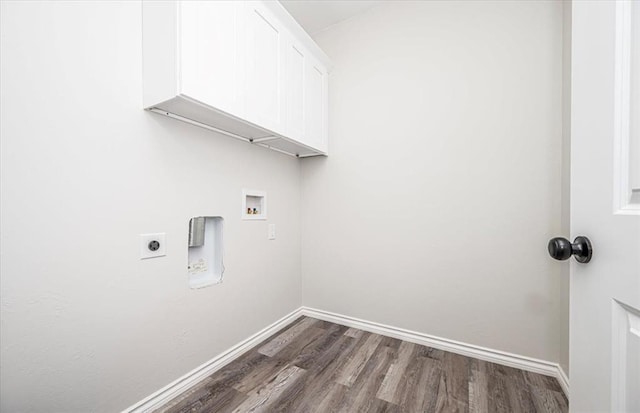 laundry area with cabinets, electric dryer hookup, dark wood-type flooring, and hookup for a washing machine