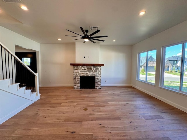 12812 Cobblestone Curve Rd, Oklahoma City, OK 73142 - unfurnished living room with light wood-type flooring, a wealth of natural light, and baseboards