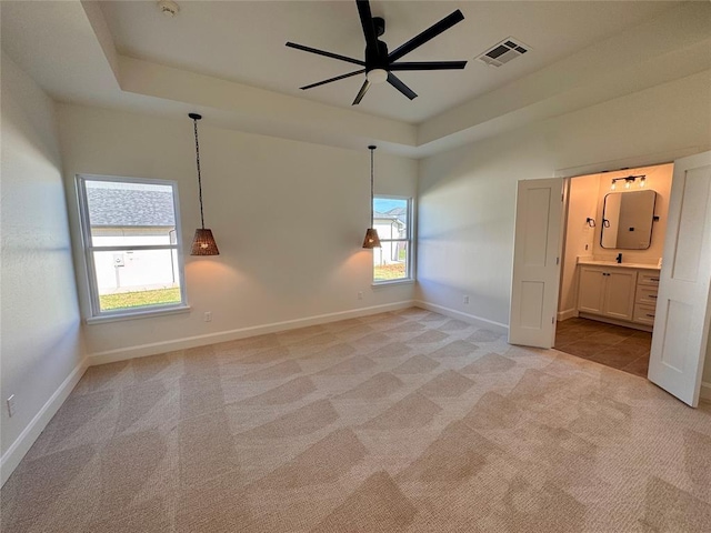 12812 Cobblestone Curve Rd, Oklahoma City, OK 73142 - unfurnished room featuring light colored carpet, ceiling fan, a wealth of natural light, and visible vents