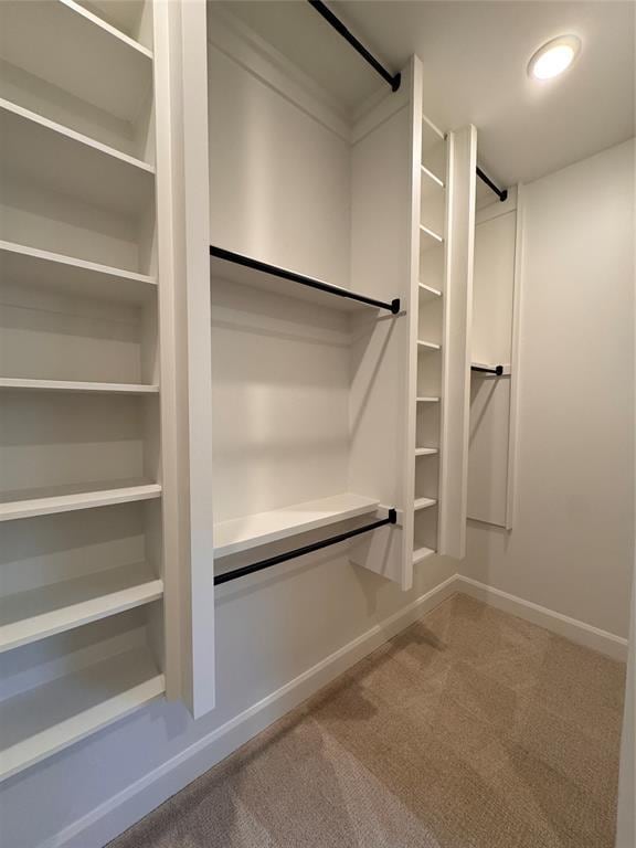 12812 Cobblestone Curve Rd, Oklahoma City, OK 73142 - spacious closet featuring carpet floors