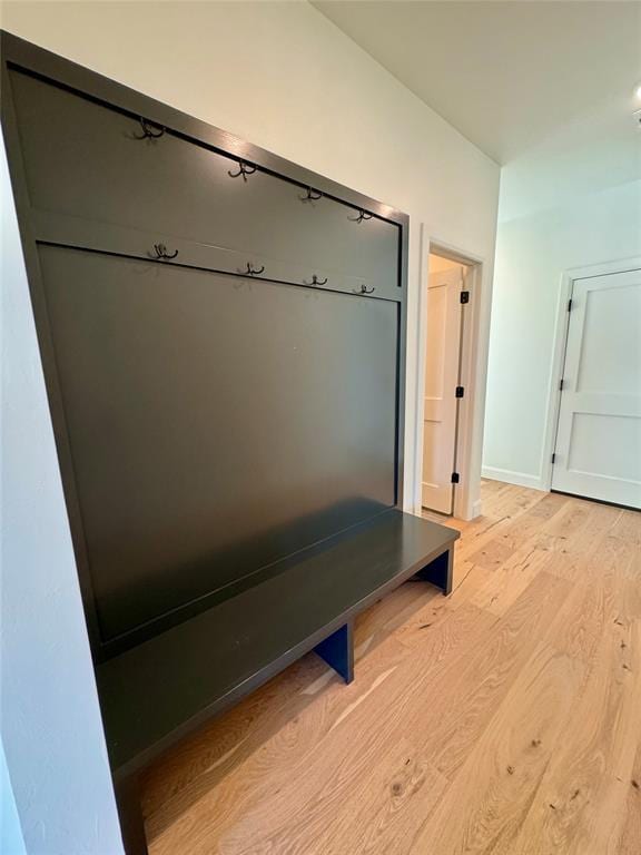 12812 Cobblestone Curve Rd, Oklahoma City, OK 73142 - mudroom with light wood finished floors and baseboards