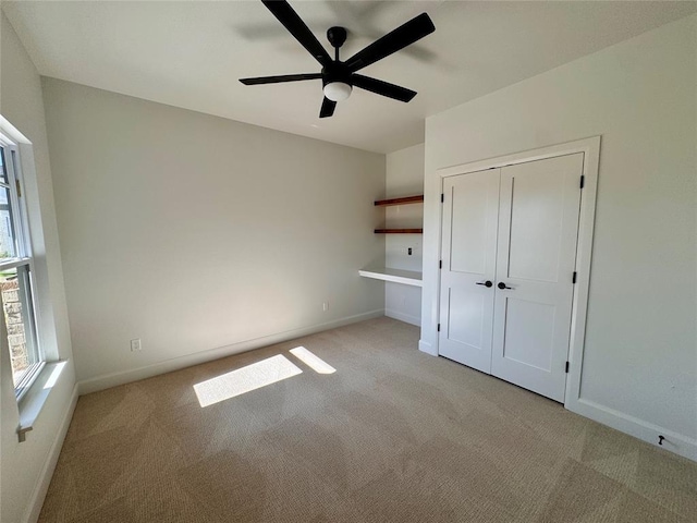 12812 Cobblestone Curve Rd, Oklahoma City, OK 73142 - unfurnished bedroom with light carpet, baseboards, and a closet